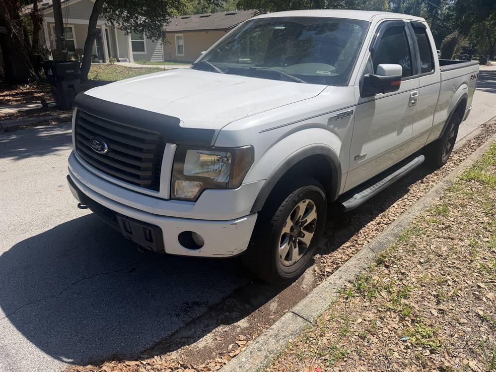 2011 Ford F150 Extended Cab (4 doors)